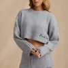 Krótki sweter z dzianiny prążkowanej w kolorze jasnoniebieskim Krótki sweter z dzianiny prążkowanej w kolorze jasnoniebieskim