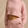 Krótki sweter z dzianiny prążkowanej w kolorze pudrowego różu Krótki sweter z dzianiny prążkowanej w kolorze pudrowego różu