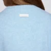 Krótki sweter z dzianiny w kolorze pudrowego błękitu Krótki sweter z dzianiny w kolorze pudrowego błękitu