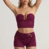 Krótki top bandeau Tarni z metalowymi detalami w kolorze jagodowo-fioletowym Krótki top bandeau Tarni z metalowymi detalami w kolorze jagodowo-fioletowym