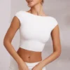 Krótki top Juno z rękawkami typu cap sleeve i odkrytymi plecami w kolorze białym Krótki top Juno z rękawkami typu cap sleeve i odkrytymi plecami w kolorze białym