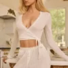 Krótki top Lou z dzianiny typu pointelle w kolorze białym Krótki top Lou z dzianiny typu pointelle w kolorze białym