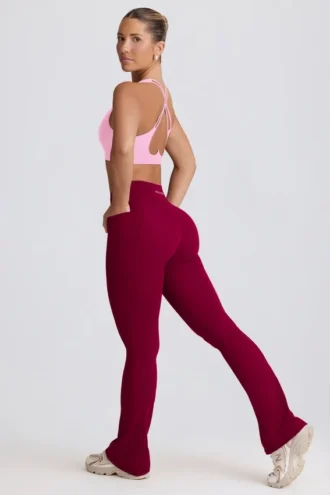 Legginsy Soft Active z kieszeniami i rozkloszowanymi nogawkami w kolorze bordowym