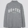 Miękki sweter oversize z dzianiny w kolorze szarym Miękki sweter oversize z dzianiny w kolorze szarym