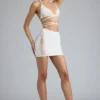 Top bikini Liberty z ozdobnymi krzyżującymi się ramiączkami w kolorze kości słoniowej Top bikini Liberty z ozdobnymi krzyżującymi się ramiączkami w kolorze kości słoniowej