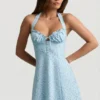 Nerine Sukienka mini z dekoltem halter i krojem w literę A w niebieski kwiatowy wzór Nerine Sukienka mini z dekoltem halter i krojem w literę A w niebieski kwiatowy wzór