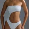 Oh Polly Moda kąpielowa: Jednoczęściowy strój kąpielowy z wycięciami i zdobieniami HOTFIX Edition w kolorze białym