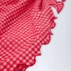 Sarong Molinas wiązany z boku w czerwoną kratkę Sarong Molinas wiązany z boku w czerwoną kratkę