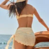 Sarong Molinas wiązany z boku w żółtą kratkę Sarong Molinas wiązany z boku w żółtą kratkę