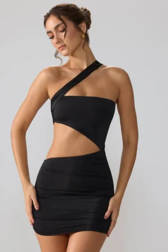 Shyla – obcisła sukienka mini z marszczonymi wycięciami z czarnego jerseyu Shyla – obcisła sukienka mini z marszczonymi wycięciami z czarnego jerseyu