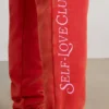 Spodnie dresowe oversize z dresówki szczotkowanej w kolorze czerwonym Spodnie dresowe oversize z dresówki szczotkowanej w kolorze czerwonym