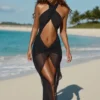 Sukienka maxi Caicos z wycięciem i wiązaniem na szyi w kolorze czarnym Sukienka maxi Caicos z wycięciem i wiązaniem na szyi w kolorze czarnym