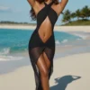 Sukienka maxi Caicos z wycięciem i wiązaniem na szyi w kolorze czarnym Sukienka maxi Caicos z wycięciem i wiązaniem na szyi w kolorze czarnym