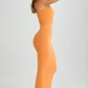 Sukienka maxi Kali z modalu z odkrytymi plecami i wiązaniem na szyi w kolorze pomarańczowym Sukienka maxi Kali z modalu z odkrytymi plecami i wiązaniem na szyi w kolorze pomarańczowym