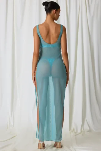 Sukienka maxi Pacifica z wycięciami i perłowymi detalami w kolorze turkusowym
