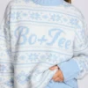 Sweter oversize z dzianiny żakardowej w kolorze pudrowego błękitu Sweter oversize z dzianiny żakardowej w kolorze pudrowego błękitu