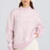 Sweter oversize z dzianiny żakardowej w kolorze różowym Sweter oversize z dzianiny żakardowej w kolorze różowym