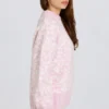 Sweter oversize z dzianiny żakardowej w kolorze różowym Sweter oversize z dzianiny żakardowej w kolorze różowym