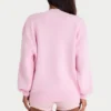 Sweter oversize z dzianiny prążkowanej w kolorze jasnoróżowym