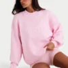 Sweter oversize z dzianiny prążkowanej w kolorze jasnoróżowym