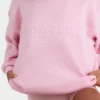 Sweter oversize z dzianiny prążkowanej w kolorze jasnoróżowym