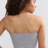 Top bandeau Soft Active z kontrastowymi wykończeniami w kolorze szarym melanżowym Top bandeau Soft Active z kontrastowymi wykończeniami w kolorze szarym melanżowym