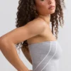 Top bandeau Soft Active z kontrastowymi wykończeniami w kolorze szarym melanżowym Top bandeau Soft Active z kontrastowymi wykończeniami w kolorze szarym melanżowym