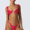 Top bikini Coquina z ozdobami w kolorze malinowo-różowym