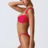 Top bikini Coquina z ozdobami w kolorze malinowo-różowym