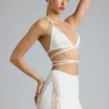 Top bikini Liberty z ozdobnymi krzyżującymi się ramiączkami w kolorze kości słoniowej Top bikini Liberty z ozdobnymi krzyżującymi się ramiączkami w kolorze kości słoniowej
