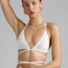 Top bikini Liberty z ozdobnymi krzyżującymi się ramiączkami w kolorze kości słoniowej Top bikini Liberty z ozdobnymi krzyżującymi się ramiączkami w kolorze kości słoniowej