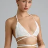 Top bikini Liberty z ozdobnymi krzyżującymi się ramiączkami w kolorze kości słoniowej Top bikini Liberty z ozdobnymi krzyżującymi się ramiączkami w kolorze kości słoniowej