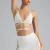 Top bikini Liberty z ozdobnymi krzyżującymi się ramiączkami w kolorze kości słoniowej Top bikini Liberty z ozdobnymi krzyżującymi się ramiączkami w kolorze kości słoniowej