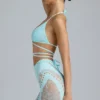 Top bikini Liberty z ozdobnymi krzyżującymi się ramiączkami w kolorze lodowoniebieskim Top bikini Liberty z ozdobnymi krzyżującymi się ramiączkami w kolorze lodowoniebieskim