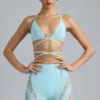 Top bikini Liberty z ozdobnymi krzyżującymi się ramiączkami w kolorze lodowoniebieskim Top bikini Liberty z ozdobnymi krzyżującymi się ramiączkami w kolorze lodowoniebieskim