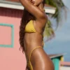 Doły od bikini Bali z ozdobnym sznurkiem w kolorze złocistożółtym Doły od bikini Bali z ozdobnym sznurkiem w kolorze złocistożółtym