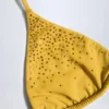 Top bikini z trójkątnymi miseczkami z ozdobami Baie w kolorze złocistożółtym Top bikini z trójkątnymi miseczkami z ozdobami Baie w kolorze złocistożółtym