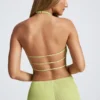 Top Elania z odkrytymi plecami i asymetrycznym dekoltem typu halter w kolorze oliwkowym Top Elania z odkrytymi plecami i asymetrycznym dekoltem typu halter w kolorze oliwkowym