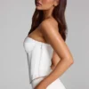 Top gorsetowy Araminta z wiązaniem w kolorze białym Top gorsetowy Araminta z wiązaniem w kolorze białym