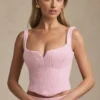Top gorsetowy Nami z wiązaniem w delikatnym różu Top gorsetowy Nami z wiązaniem w delikatnym różu