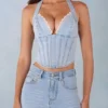 Top Lotta w stylu gorsetu z wiązaniem na szyi, z jasnego dżinsu Top Lotta w stylu gorsetu z wiązaniem na szyi, z jasnego dżinsu