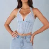 Top Lotta w stylu gorsetu z wiązaniem na szyi, z jasnego dżinsu Top Lotta w stylu gorsetu z wiązaniem na szyi, z jasnego dżinsu