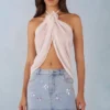 Top z odkrytym dekoltem i wiązaniem na szyi Virelle w kolorze kości słoniowej Top z odkrytym dekoltem i wiązaniem na szyi Virelle w kolorze kości słoniowej