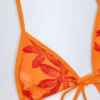 Trójkątny top bikini Paita w pomarańczowo-orchideowy wzór Trójkątny top bikini Paita w pomarańczowo-orchideowy wzór